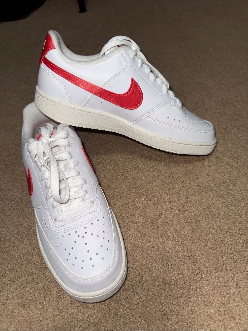 Nike White Low-Top Sneakers with Salmon Swoosh and Heel